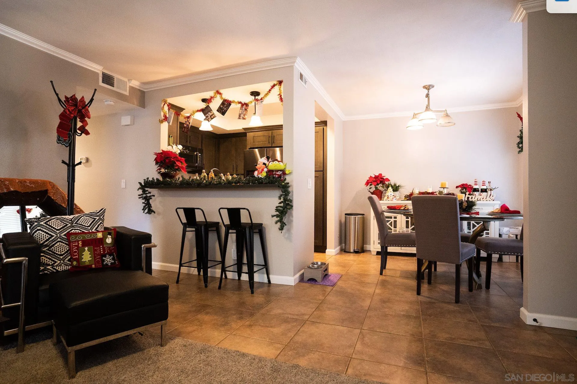 730 Brookstone Road, Unit 103 Eastlake, CA 91913 - Photo 7 of 25 a view of a dining room with furniture and chandelier