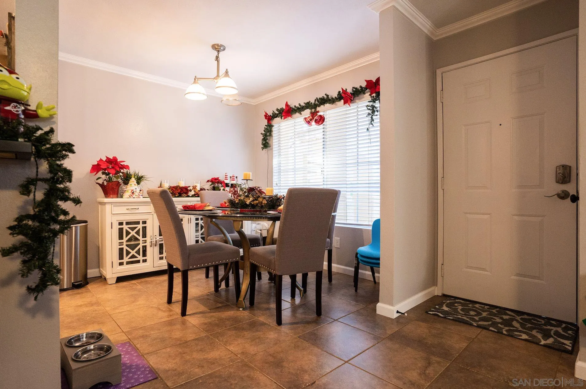 730 Brookstone Road, Unit 103 Eastlake, CA 91913 - Photo 9 of 25 a view of a dining room with furniture and chandelier