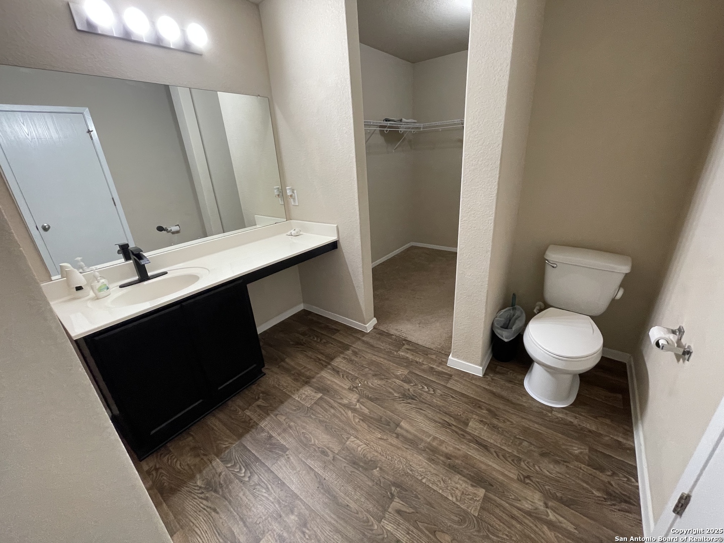 10014 Raspberry Oak San Antonio, TX 78223 - Photo 12 of 20 a bathroom with a sink and a mirror
