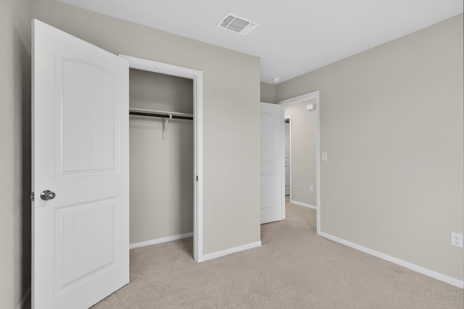 2006 Grow Lane Austin, TX 78754 - Photo 22 of 40 An inviting bedroom offers neutral tones, soft carpeting, and convenient closet storage.