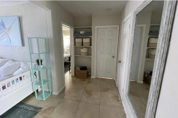 a view of an entryway with a livingroom