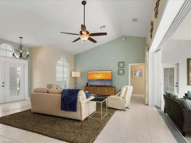 a living room with furniture and window