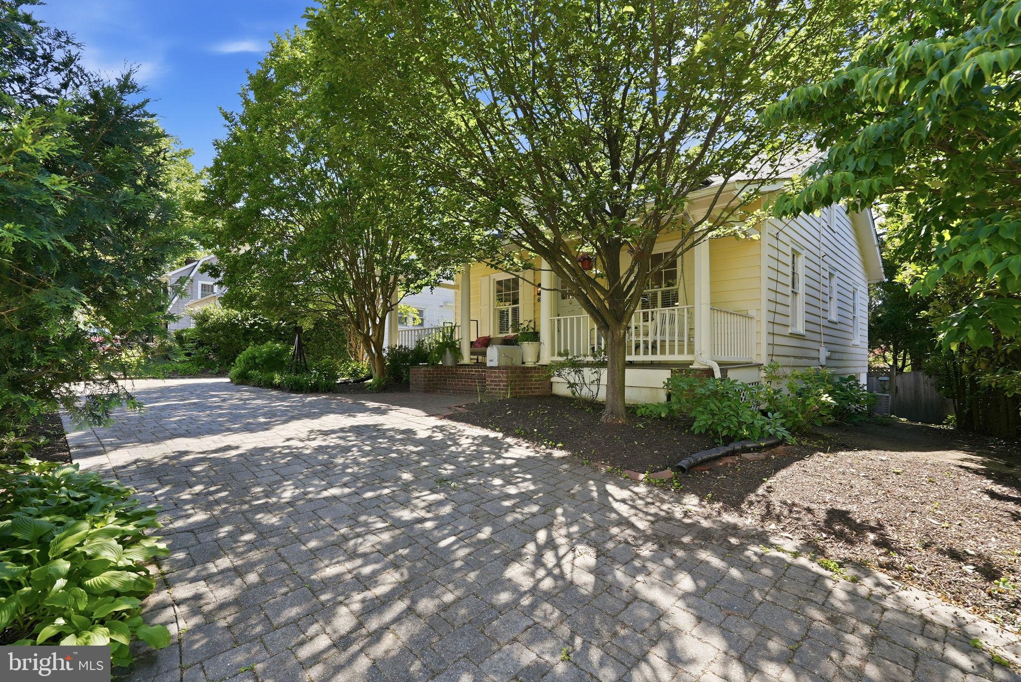 6814 Brookville Road Chevy Chase, MD 20815 - Photo 36 of 39 Charming home with lush greenery.