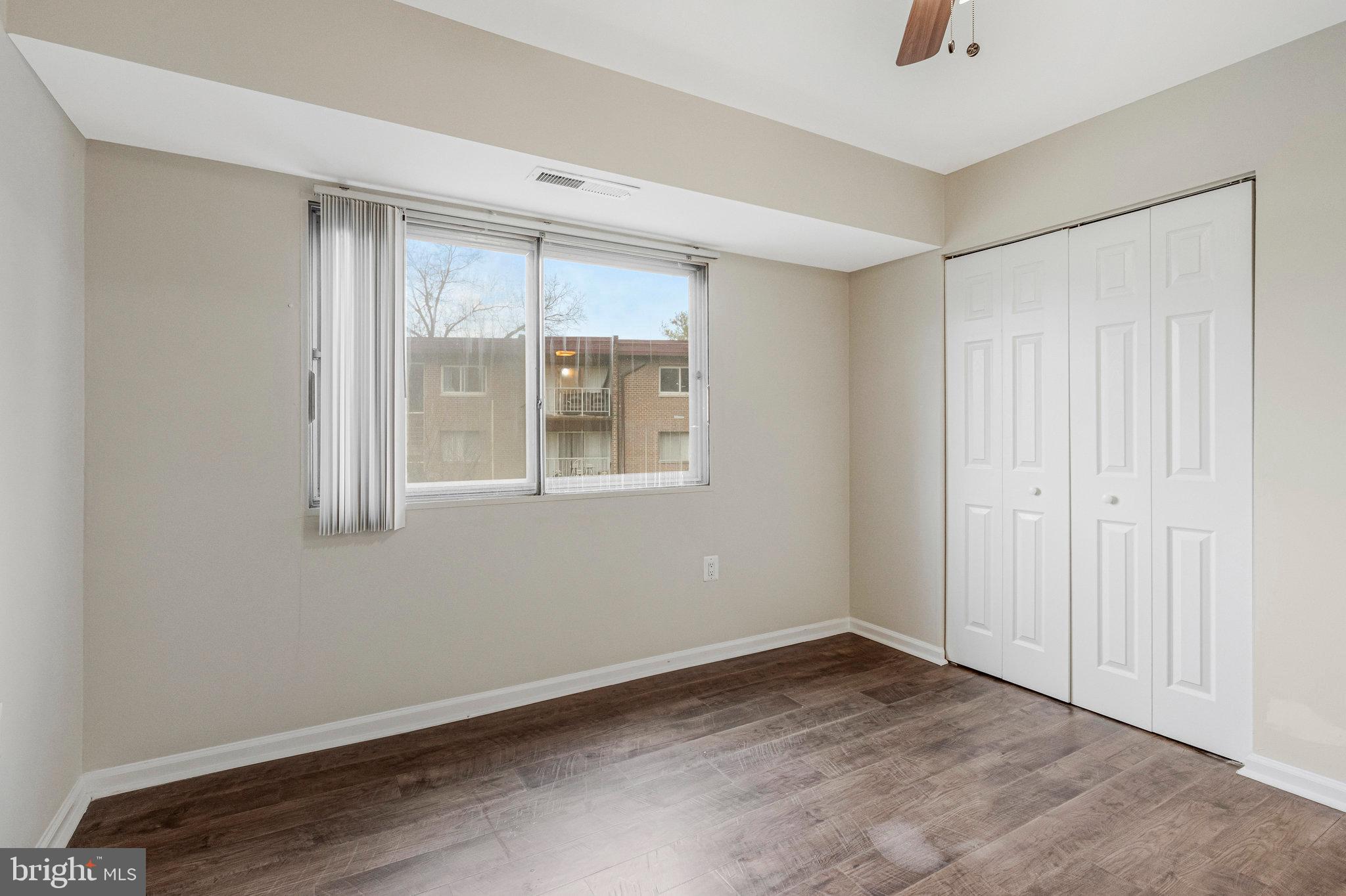 3802 Bel Pre Road, Unit 38025 Silver Spring, MD 20906 - Photo 21 of 36 an empty room with a window