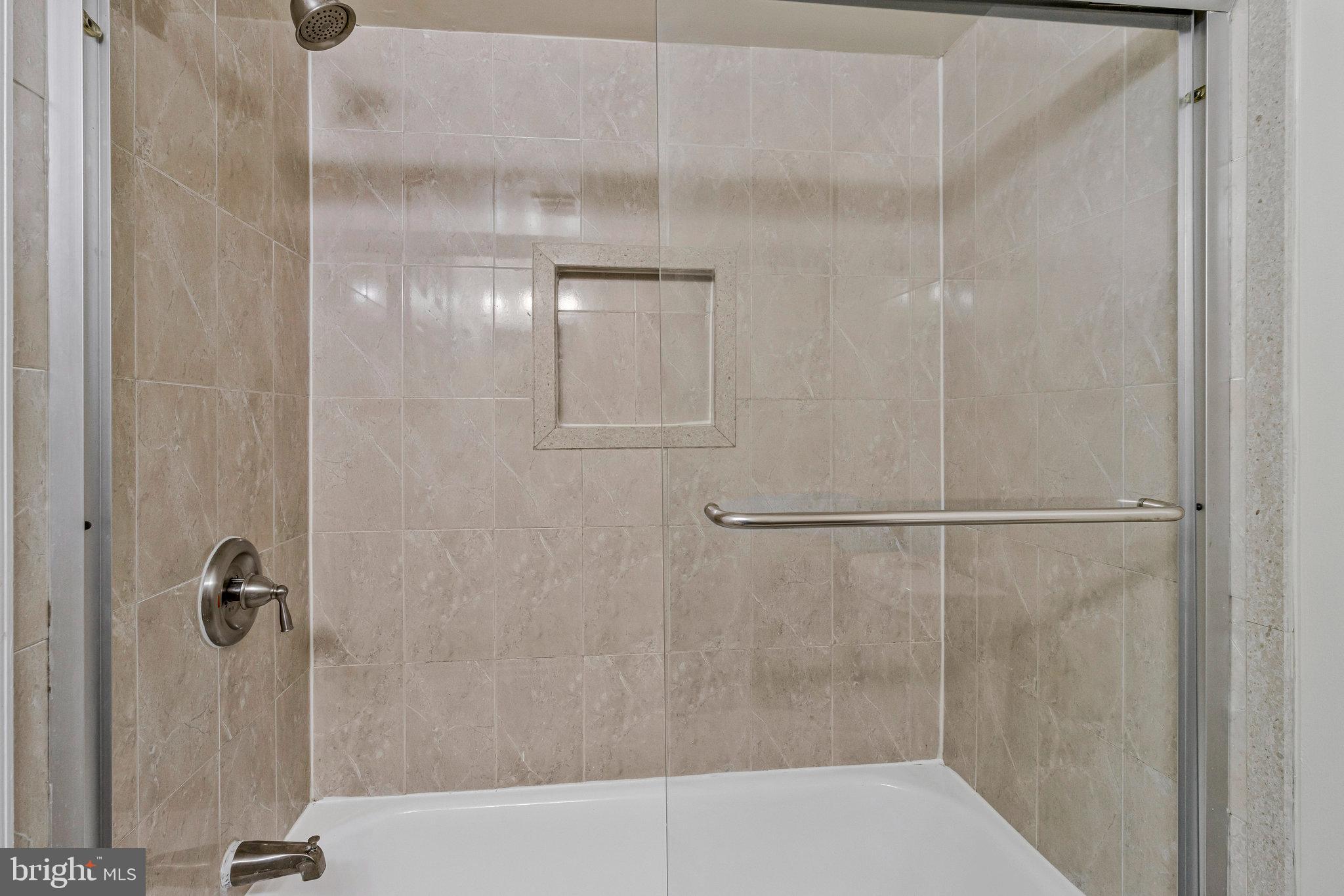 3802 Bel Pre Road, Unit 38025 Silver Spring, MD 20906 - Photo 25 of 36 a bathroom with a shower