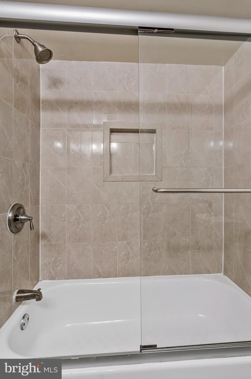 3802 Bel Pre Road, Unit 38025 Silver Spring, MD 20906 - Photo 26 of 36 a bathroom with a shower