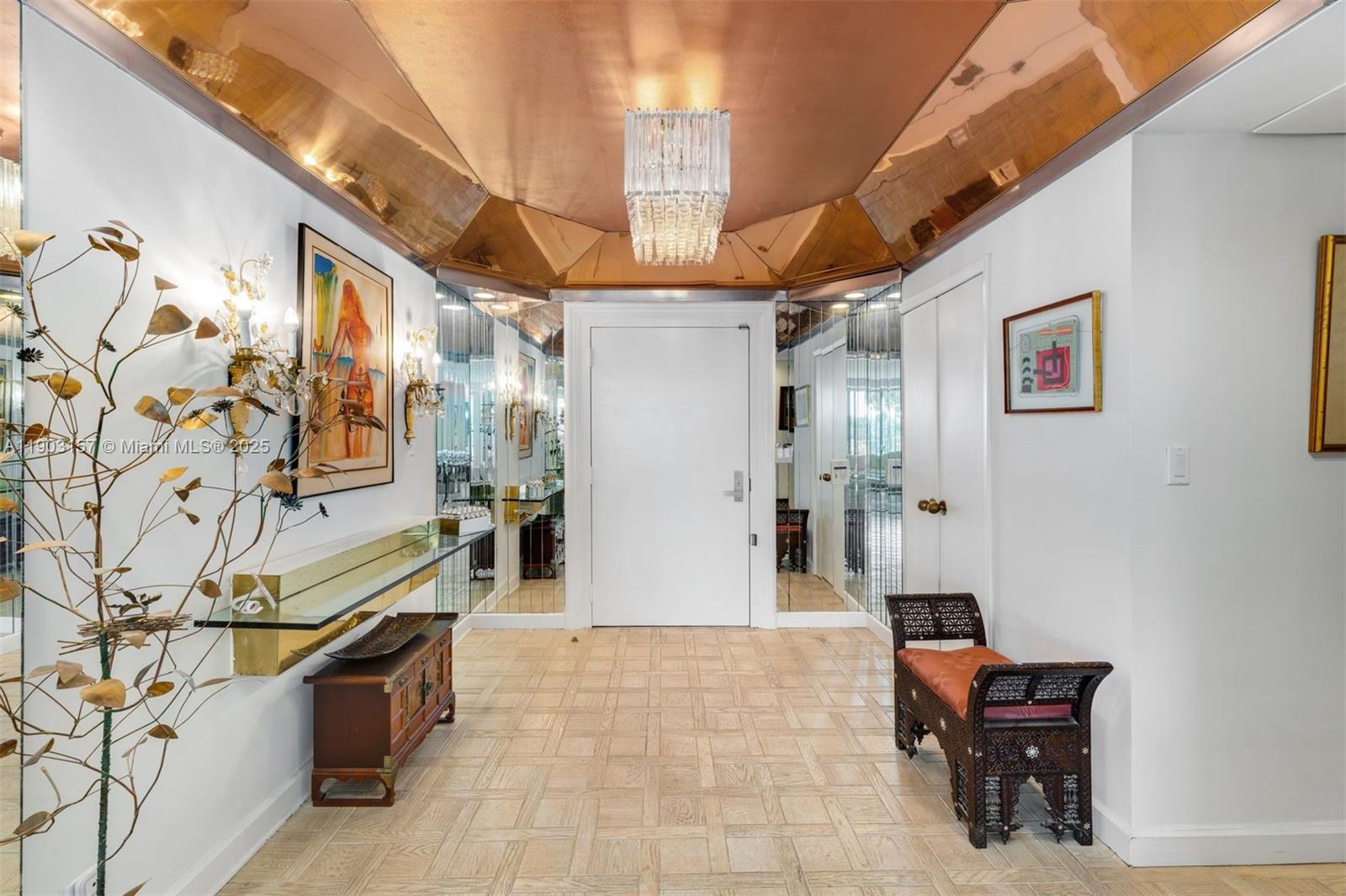 10155 Collins Avenue, Unit 307 Bal Harbour, FL 33154 - Photo 6 of 18 a view of a hallway with seating area