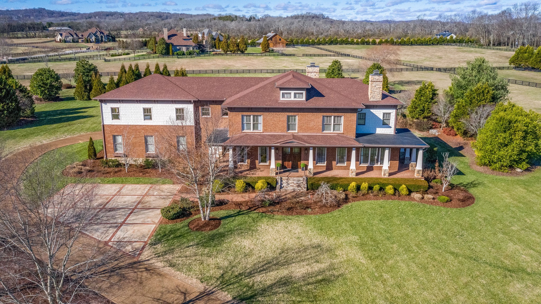 an aerial view of a house with garden