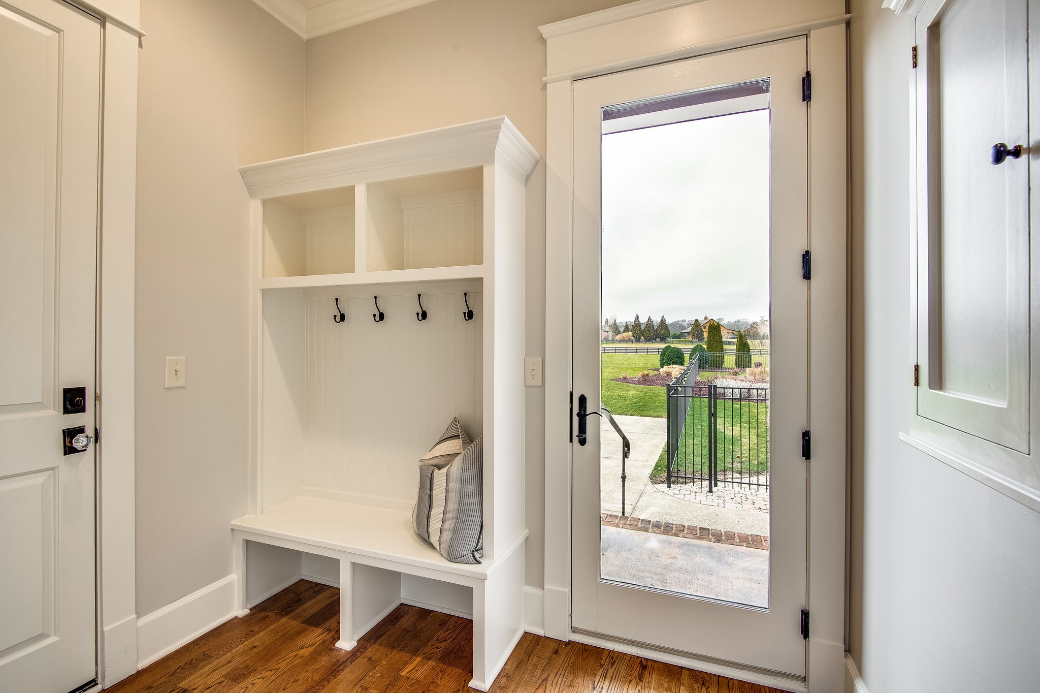 4205 Two Rivers Lane Franklin, TN 37069 - Photo 24 of 46 a view of a balcony with wooden floor and a hallway