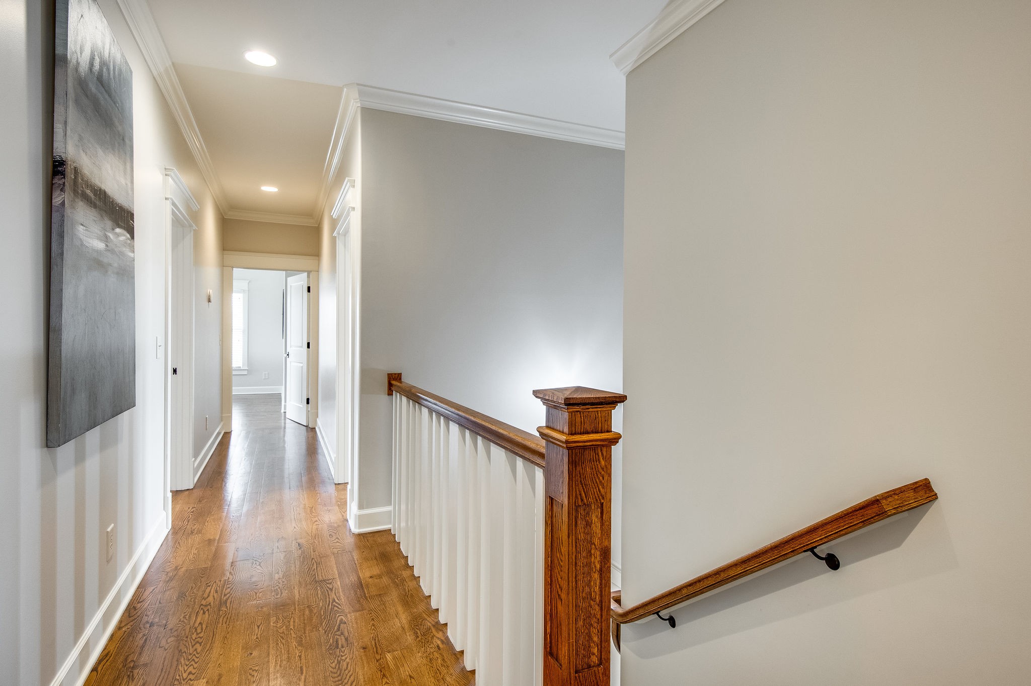 4205 Two Rivers Lane Franklin, TN 37069 - Photo 32 of 46 a view of a hallway with wooden floor