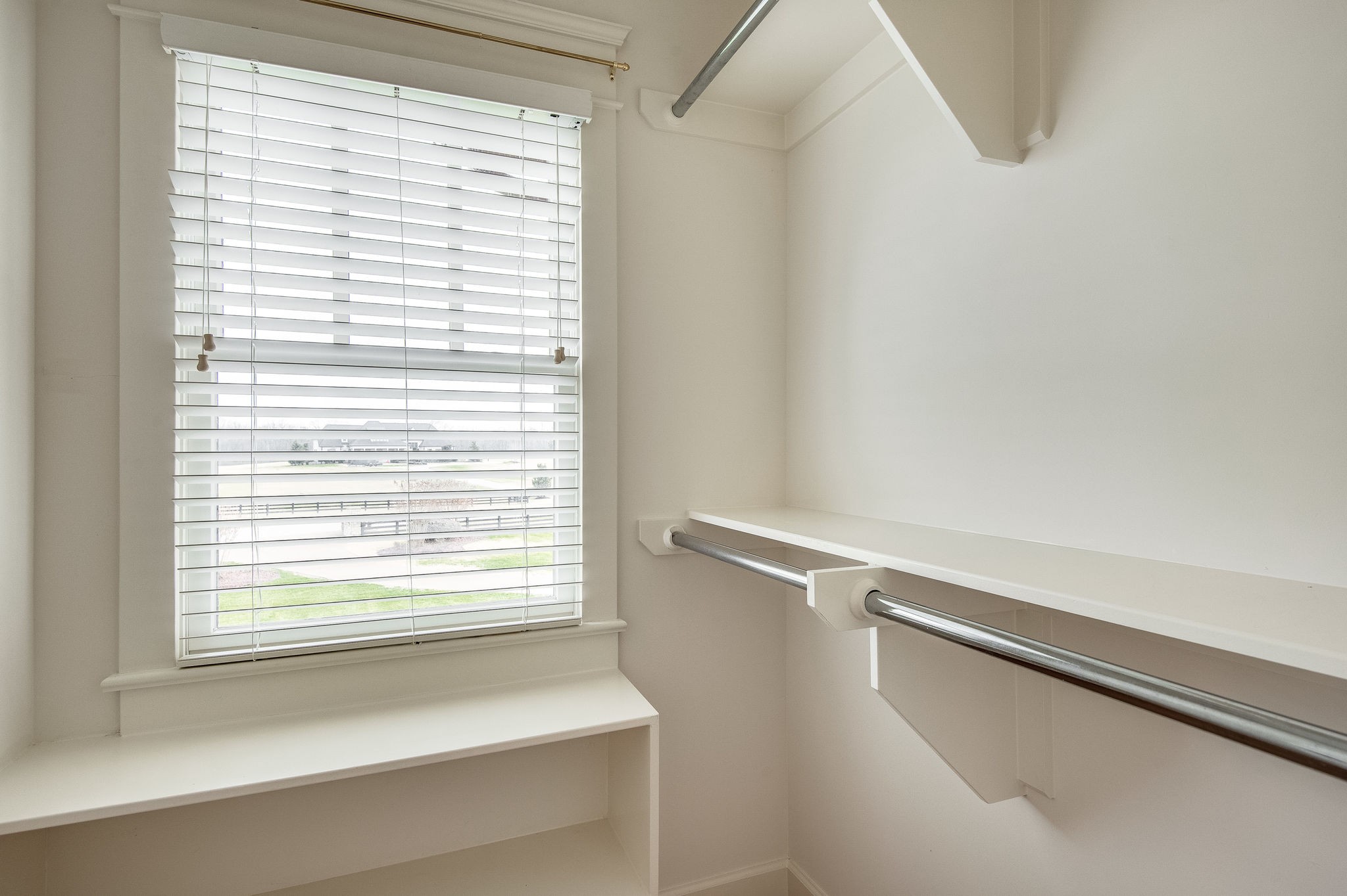 4205 Two Rivers Lane Franklin, TN 37069 - Photo 34 of 46 a view of a room with racks on the wall