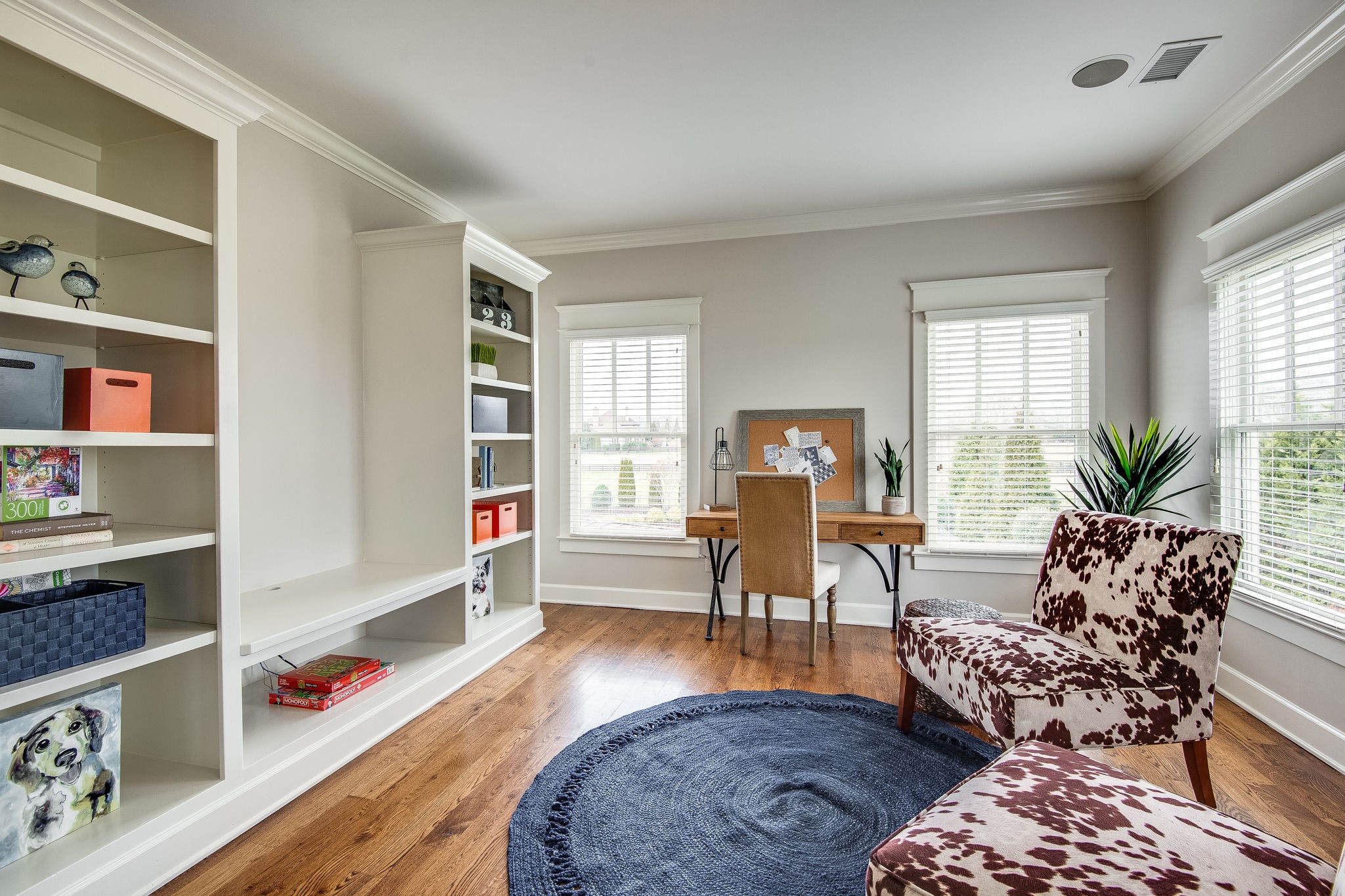 4205 Two Rivers Lane Franklin, TN 37069 - Photo 38 of 46 a living room with furniture and wooden floor