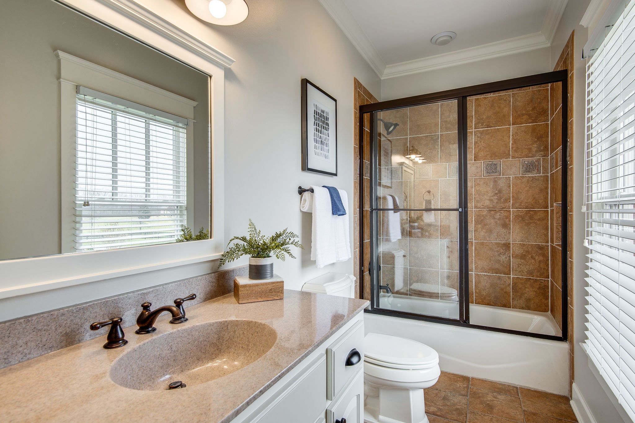 4205 Two Rivers Lane Franklin, TN 37069 - Photo 40 of 46 a bathroom with a sink toilet and shower