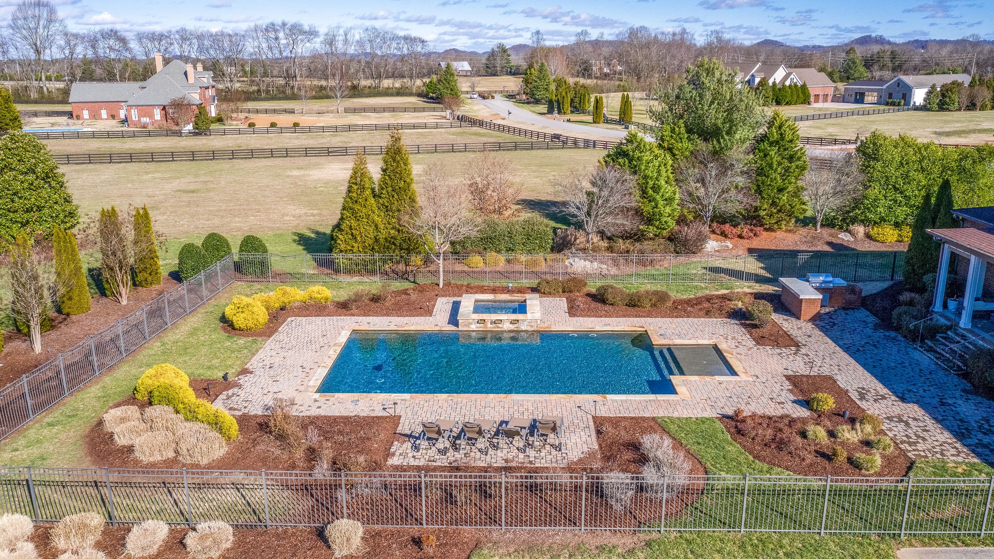 4205 Two Rivers Lane Franklin, TN 37069 - Photo 5 of 46 a view of a swimming pool with a patio and a yard