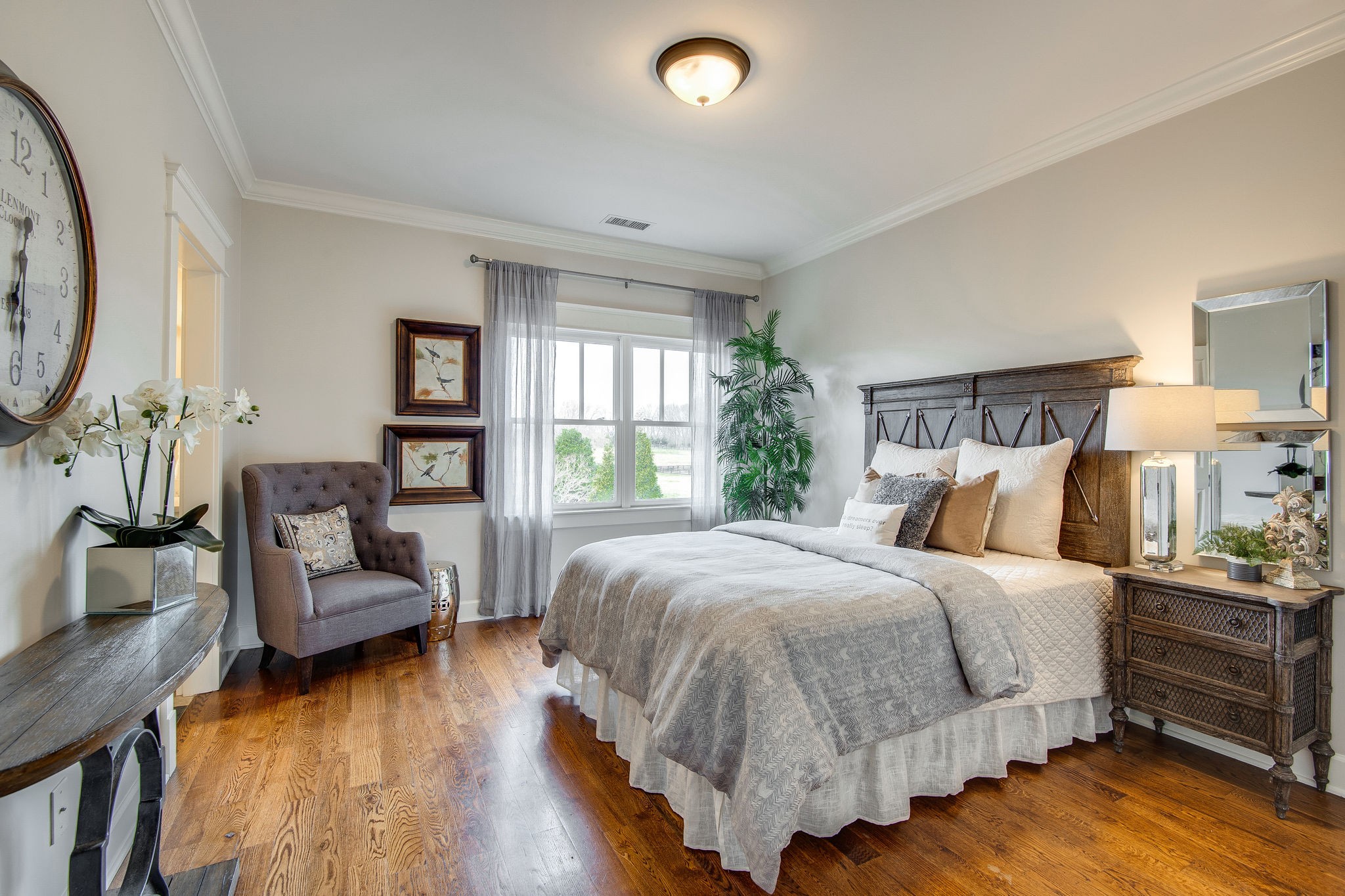 4205 Two Rivers Lane Franklin, TN 37069 - Photo 41 of 46 a spacious bedroom with a bed and a couch