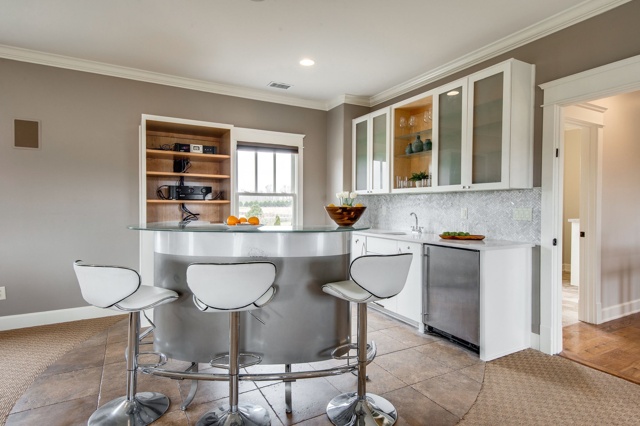 4205 Two Rivers Lane Franklin, TN 37069 - Photo 45 of 46 a kitchen with a dining table chairs and sink