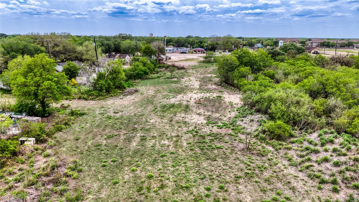 900 North Johnson Street Alice, TX 78332 - Photo 29 of 37 an aerial view of residential houses with outdoor space and trees