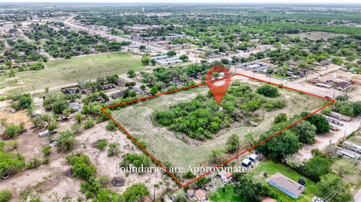 900 North Johnson Street Alice, TX 78332 - Photo 7 of 37 an aerial view of residential houses with outdoor space and trees