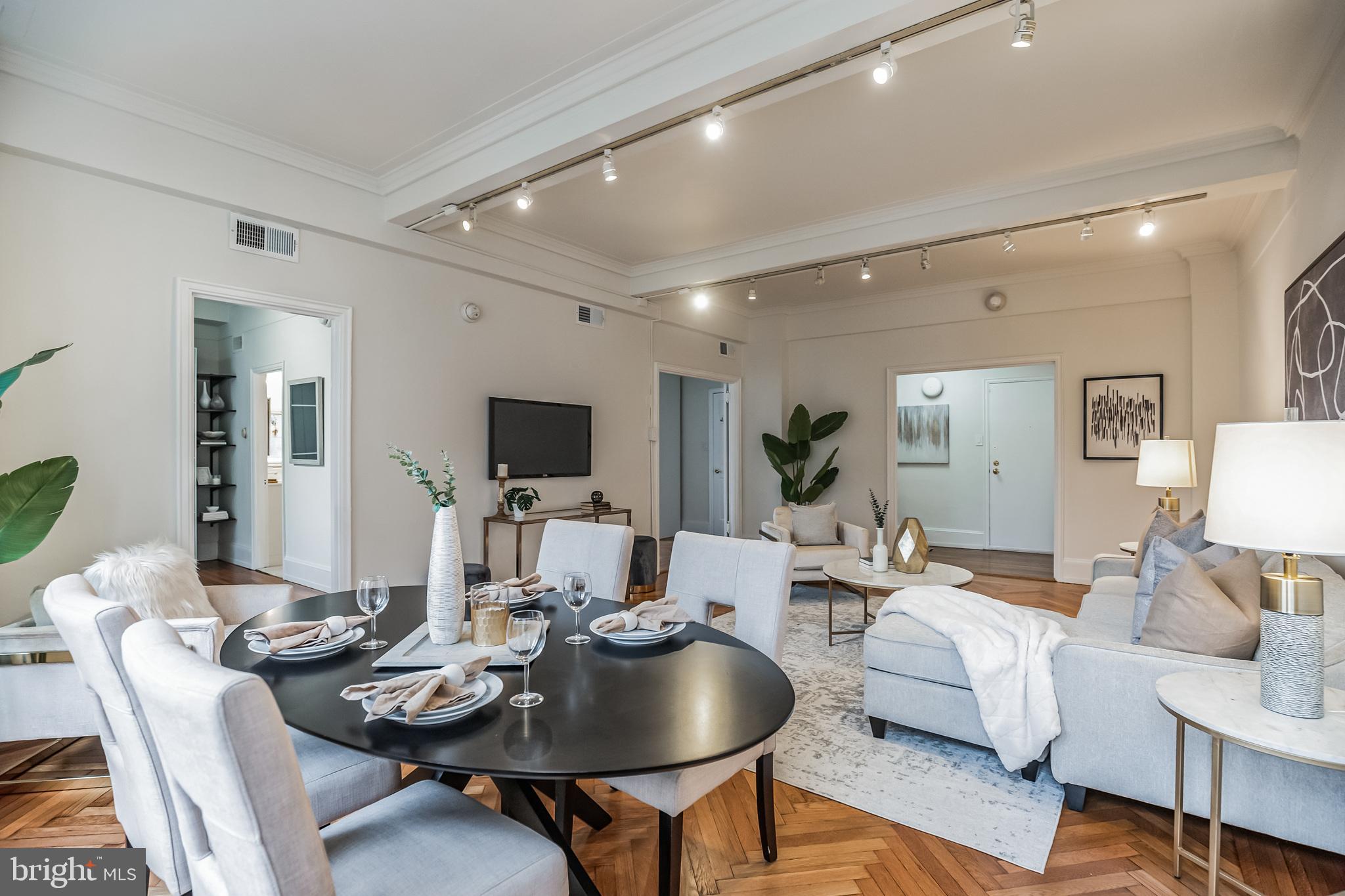 1900 Rittenhouse Square, Unit 4B Philadelphia, PA 19103 - Photo 5 of 22 Living Room + Dining Room