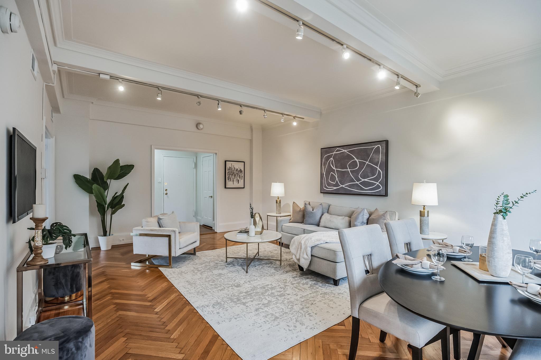 1900 Rittenhouse Square, Unit 4B Philadelphia, PA 19103 - Photo 7 of 22 Living Room + Dining Room