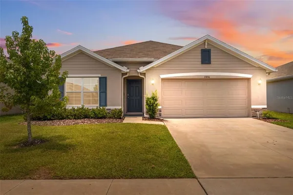 a front view of house with yard