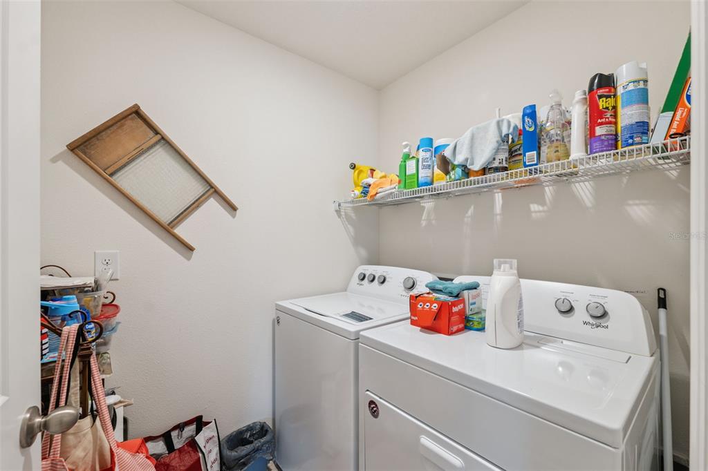 13196 Golden Lime Ave Spring Hill Spring Hill, FL 34609 - Photo 25 of 73 a utility room with dryer and washer