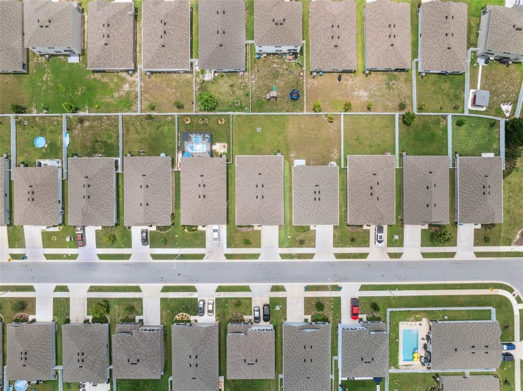 13196 Golden Lime Ave Spring Hill Spring Hill, FL 34609 - Photo 64 of 73 an aerial view of a city with large buildings