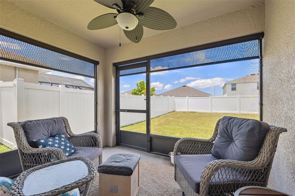 13196 Golden Lime Ave Spring Hill Spring Hill, FL 34609 - Photo 7 of 73 a living room with furniture and a large window