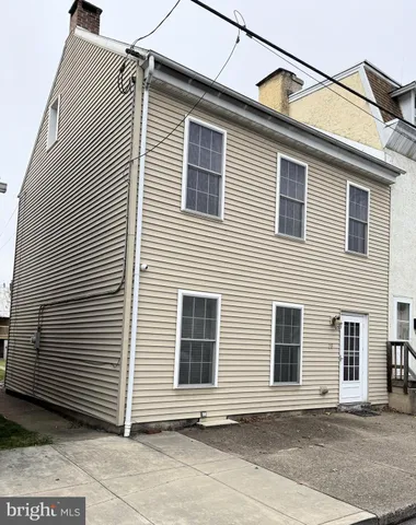 a view of a house with a garage