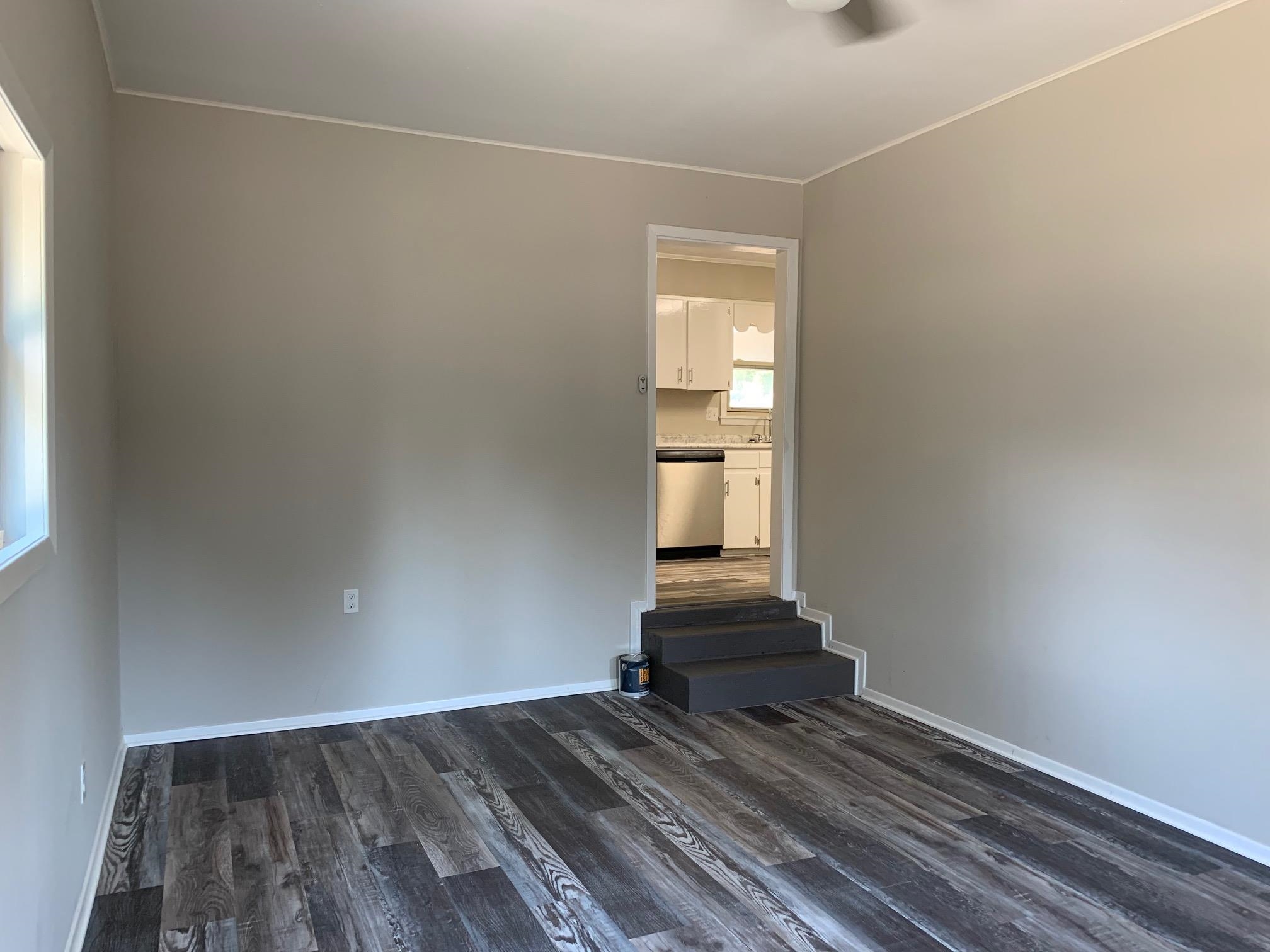 334 Sherrin Drive Ripley, TN 38063 - Photo 11 of 19 a view of a room with wooden floor and fence