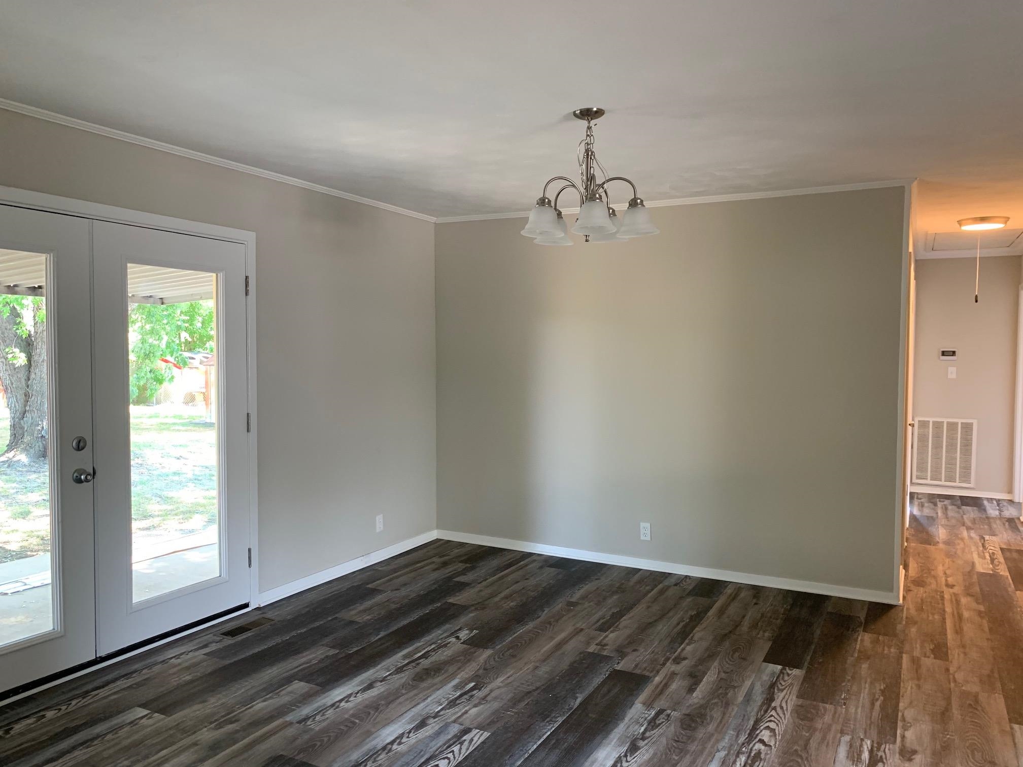 334 Sherrin Drive Ripley, TN 38063 - Photo 13 of 19 a view of a room with wooden floor and window