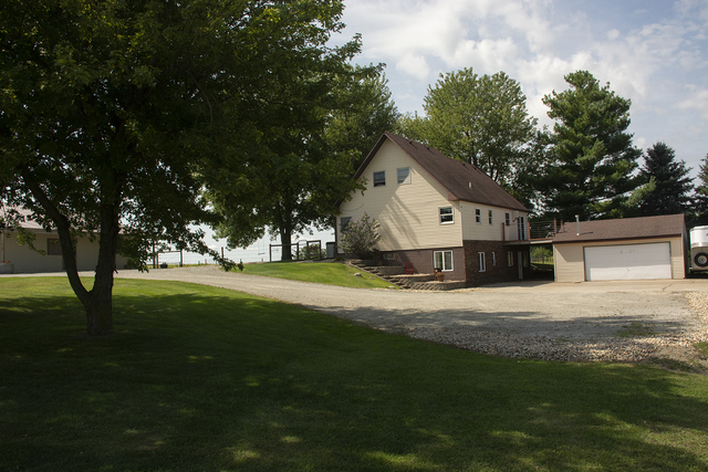 15755 Hillside Road Morrison, IL 61270 - Photo 2 of 26 a front view of house with yard and green space