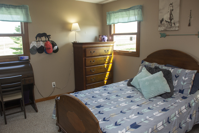 15755 Hillside Road Morrison, IL 61270 - Photo 11 of 26 a bedroom with a bed and a window