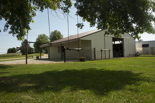 15755 Hillside Road Morrison, IL 61270 - Photo 4 of 26 a view of a backyard with large trees