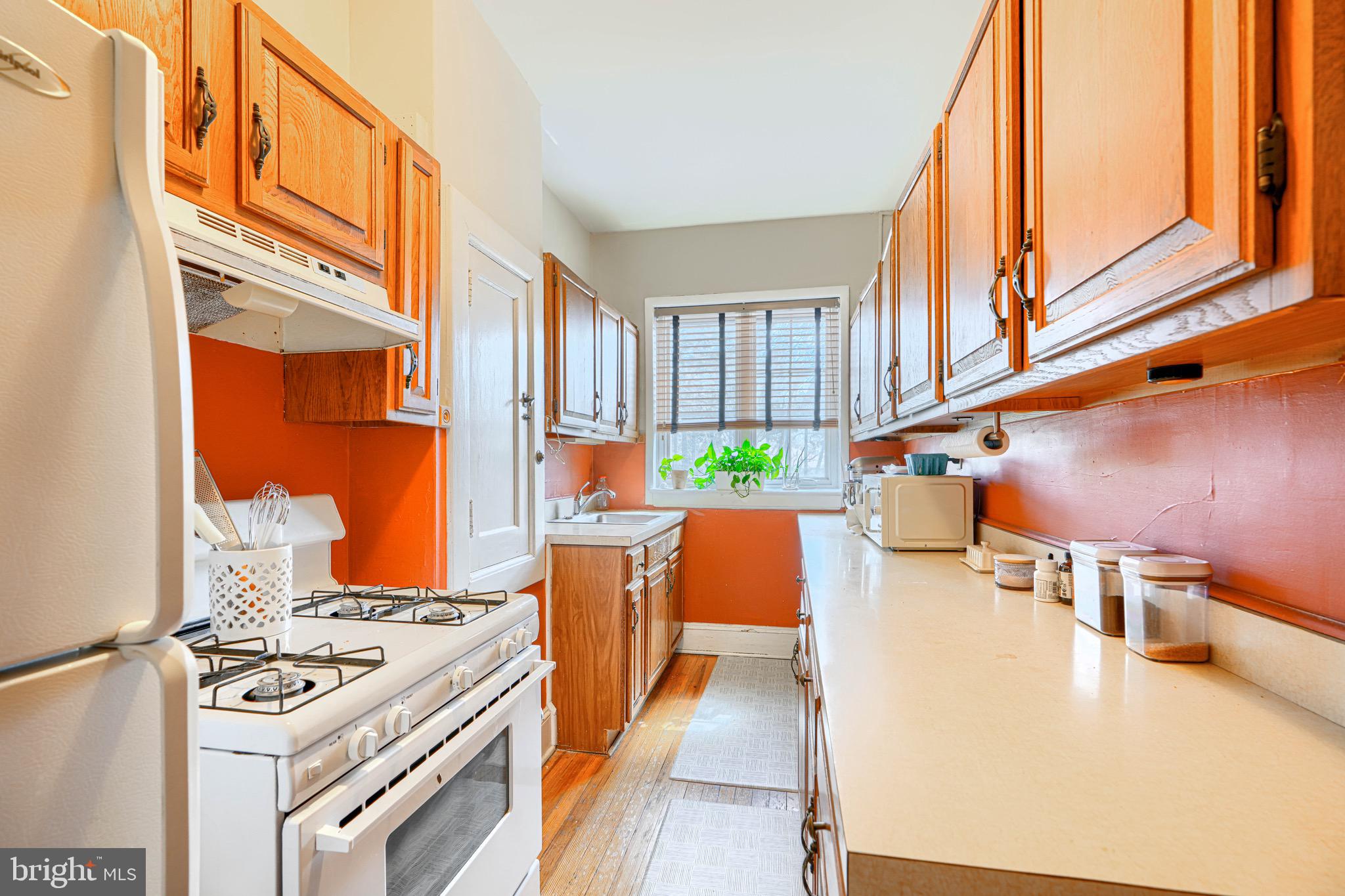 607 Somerset Road, Unit 5 Baltimore, MD 21210 - Photo 16 of 38 a view of kitchen with furniture and a window
