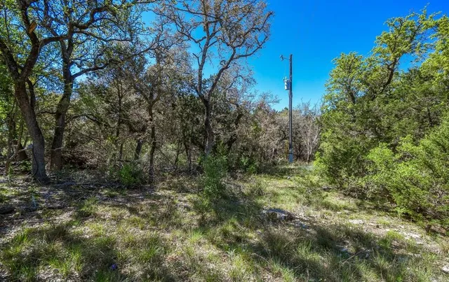 a view of a lake with houses in outdoor space