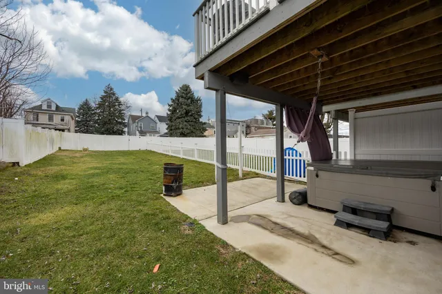 a view of a backyard of the house