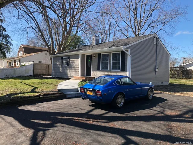 a car parked in front of a house