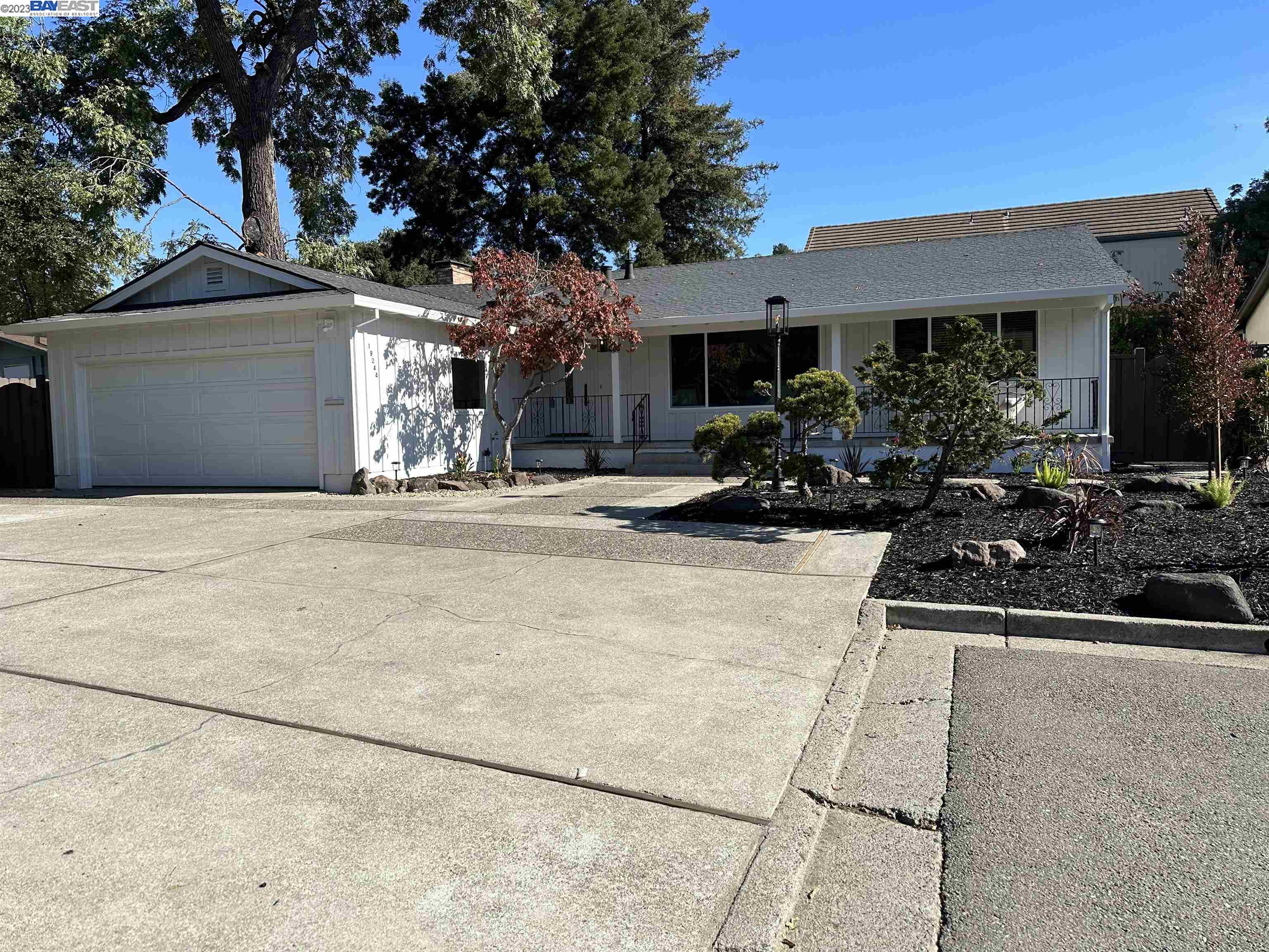 19244 Pinehaven Place Castro Valley, CA 94546 - Photo 1 of 1 a view of a house with potted plants and a tree