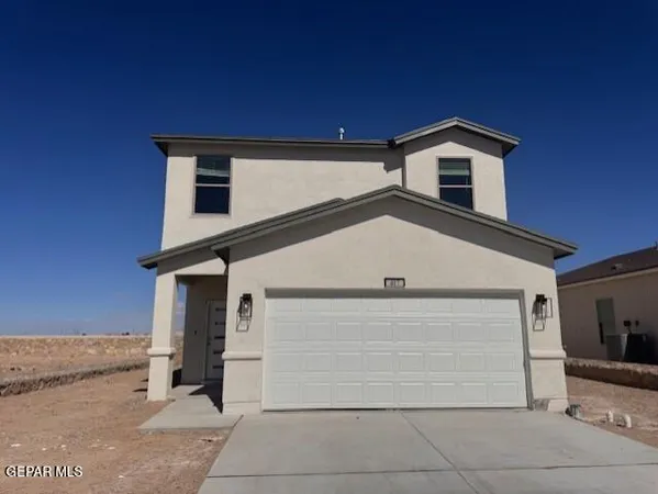 a view of a house with garage