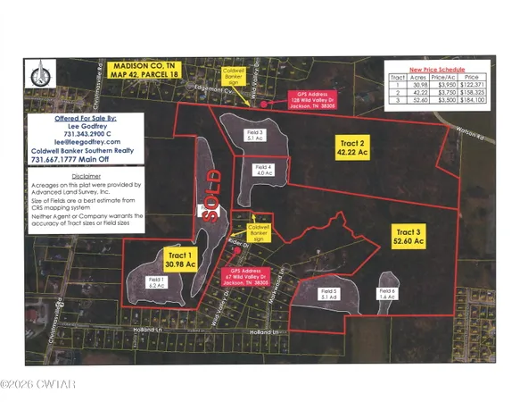 a bathroom with a sink and a sign