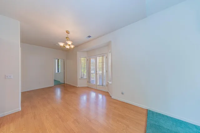 a kitchen with a sink and a refrigerator