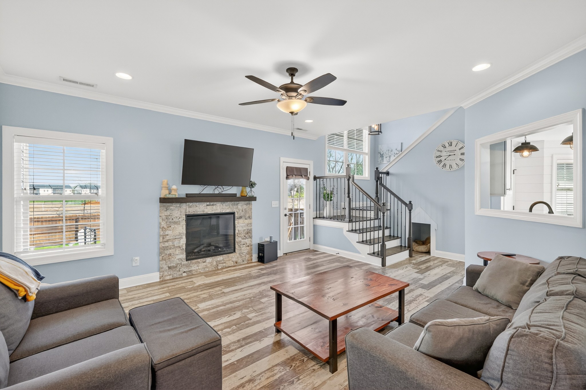 1319 Dodd Trail Murfreesboro, TN 37128 - Photo 15 of 23 a living room with furniture a fireplace and a flat screen tv