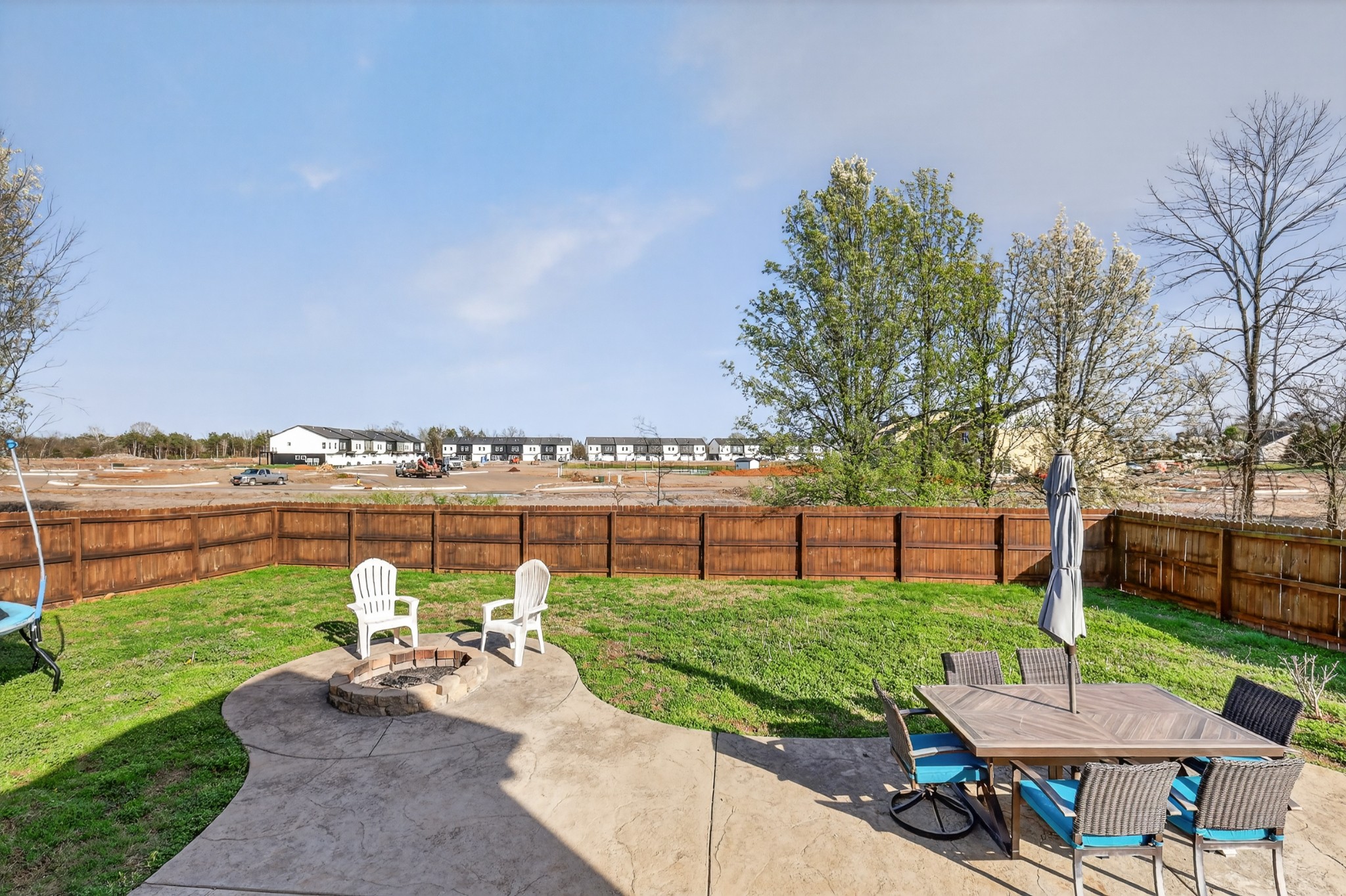 1319 Dodd Trail Murfreesboro, TN 37128 - Photo 21 of 23 a view of a garden with a table and chairs under an umbrella
