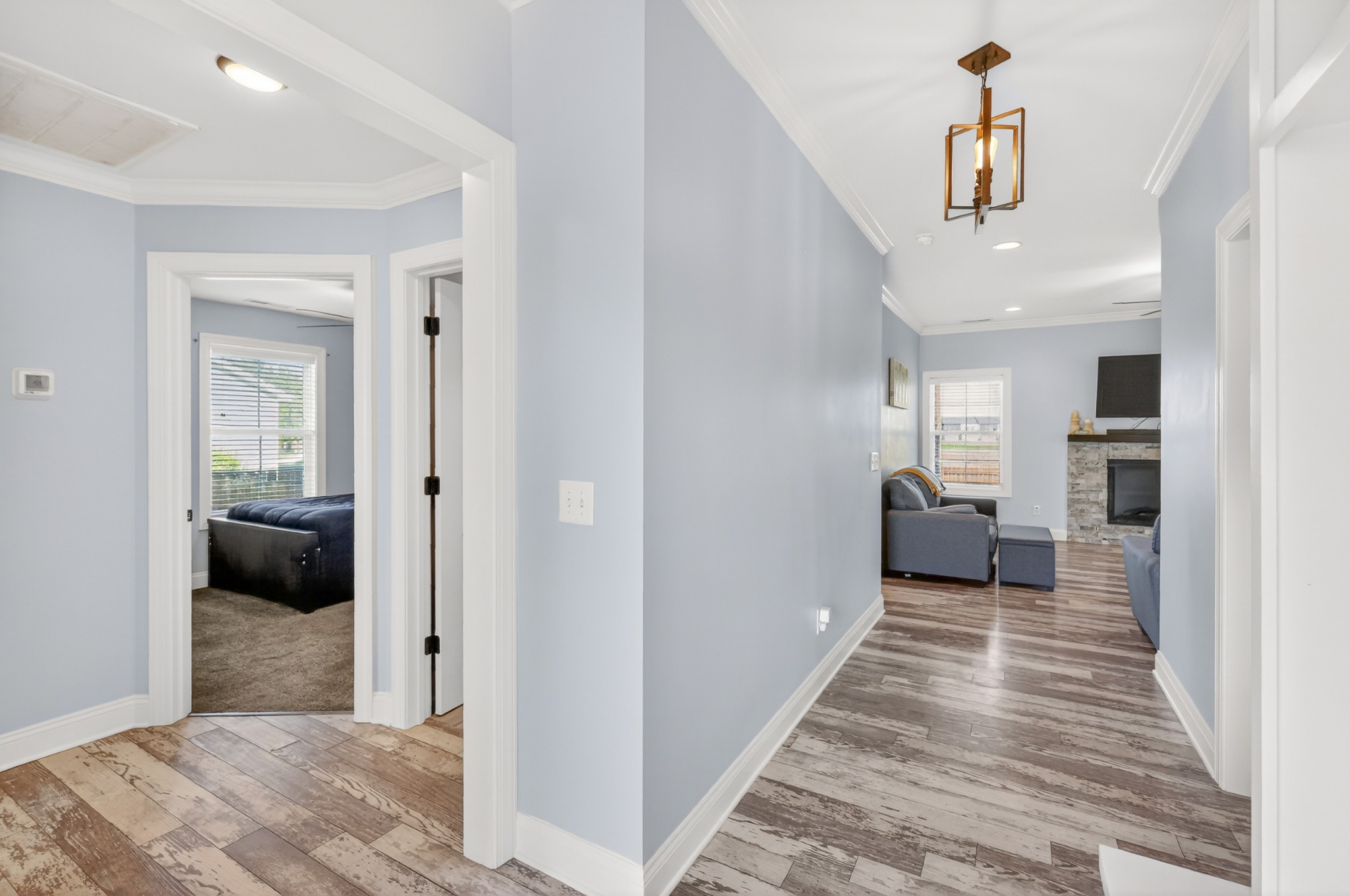 1319 Dodd Trail Murfreesboro, TN 37128 - Photo 4 of 23 a view of a hallway with a bedroom and a bed