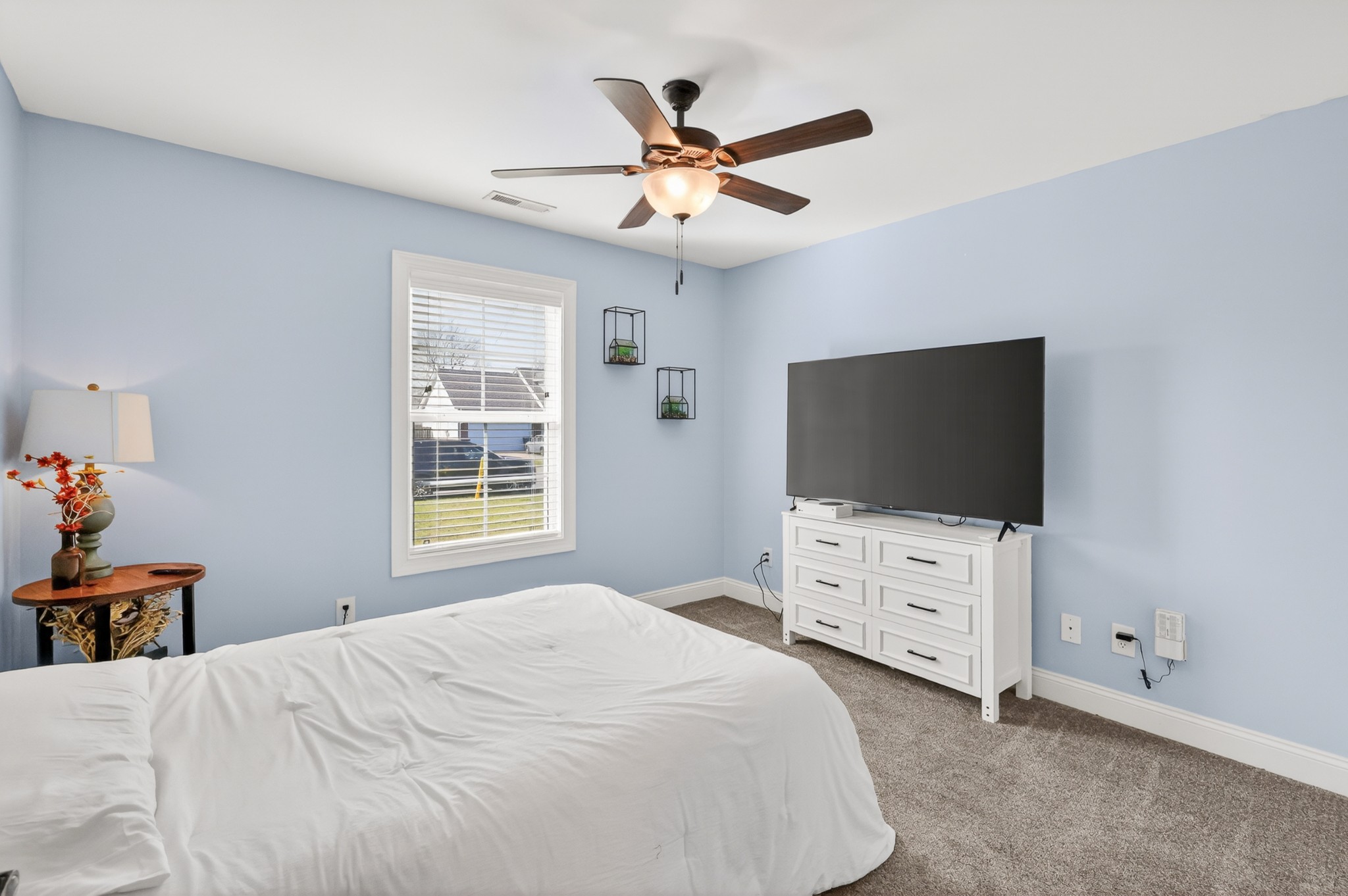 1319 Dodd Trail Murfreesboro, TN 37128 - Photo 5 of 23 a bedroom with a bed and a flat screen tv