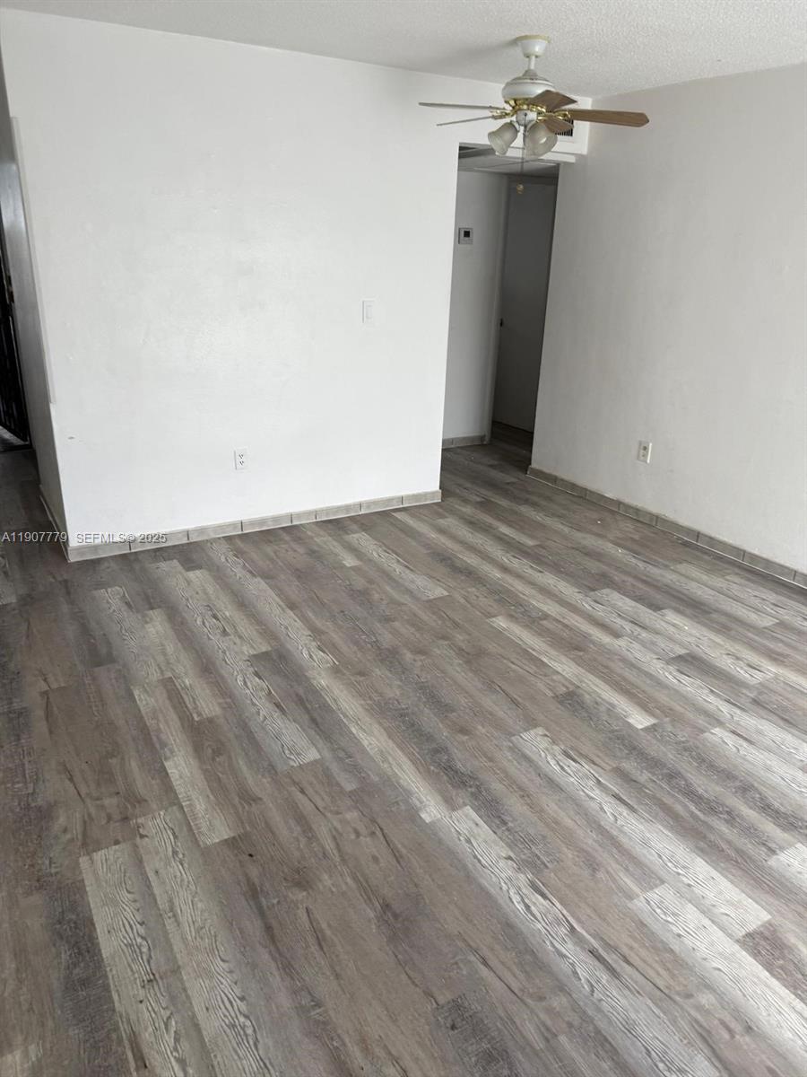 2498 Southwest 17th Avenue, Unit 4311 Miami, FL 33133 - Photo 2 of 15 wooden floor in a room