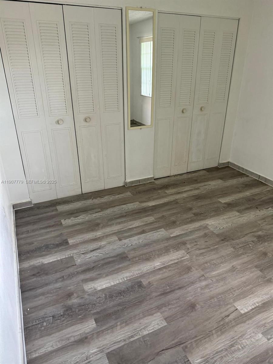 2498 Southwest 17th Avenue, Unit 4311 Miami, FL 33133 - Photo 8 of 15 a view of wooden floor