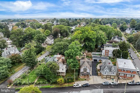 an aerial view of a city with lots of residential buildings