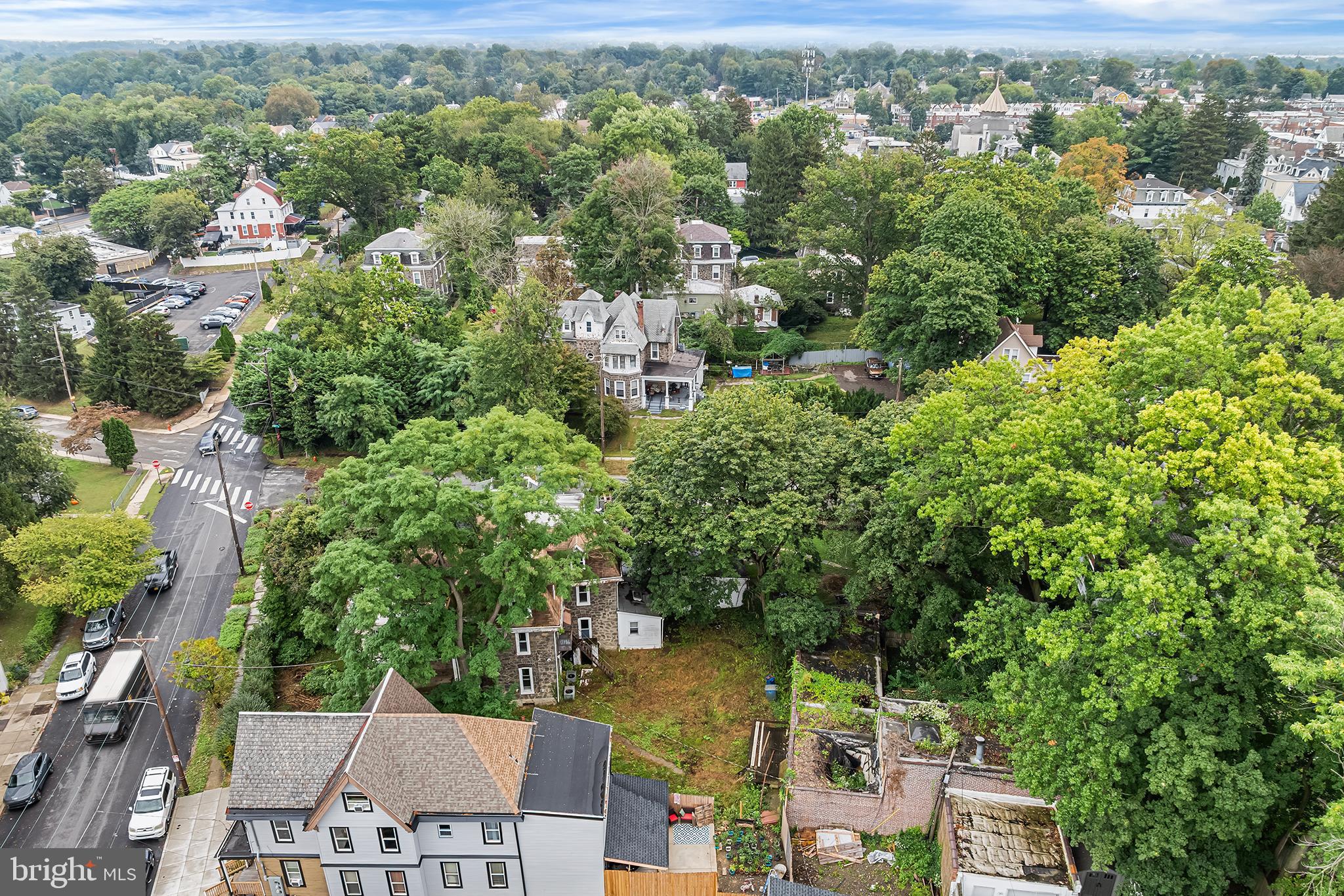 702 Oak Lane Philadelphia, PA 19126 - Photo 7 of 19 an aerial view of residential houses with outdoor space and trees